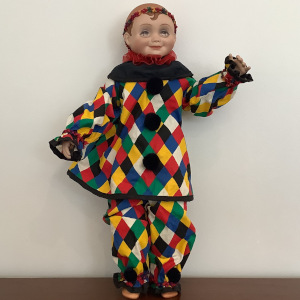 18-inch Harlequin doll with painted hair and multicolored diamond jumpsuit