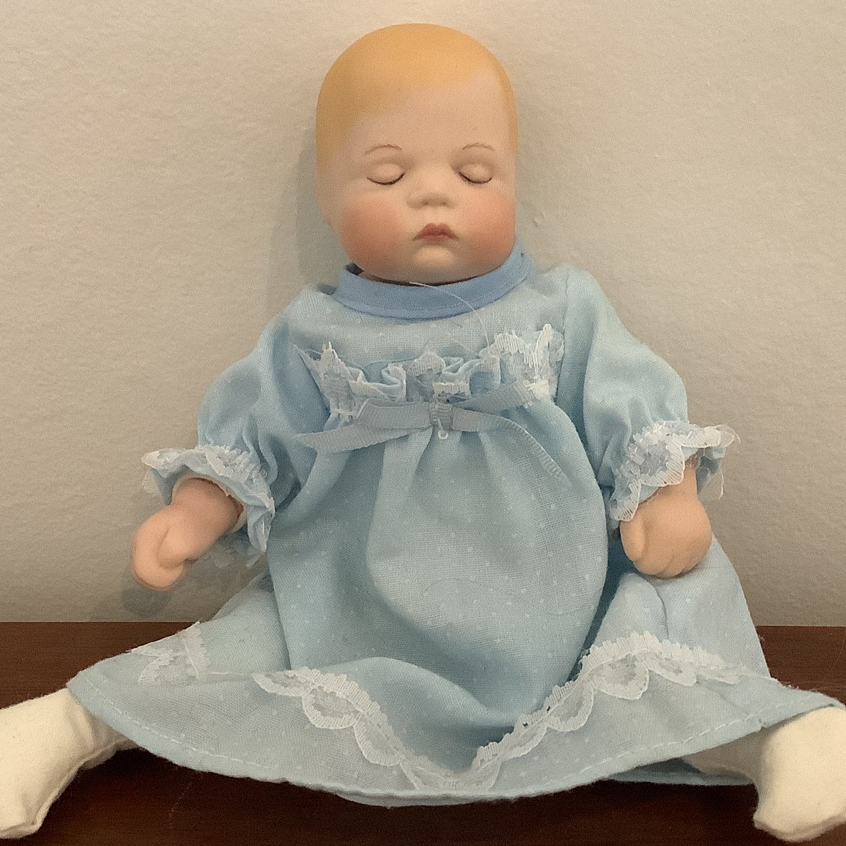 Modern 7-inch Sugar Lump doll with closed eyes, painted blond hair and blue nightgown