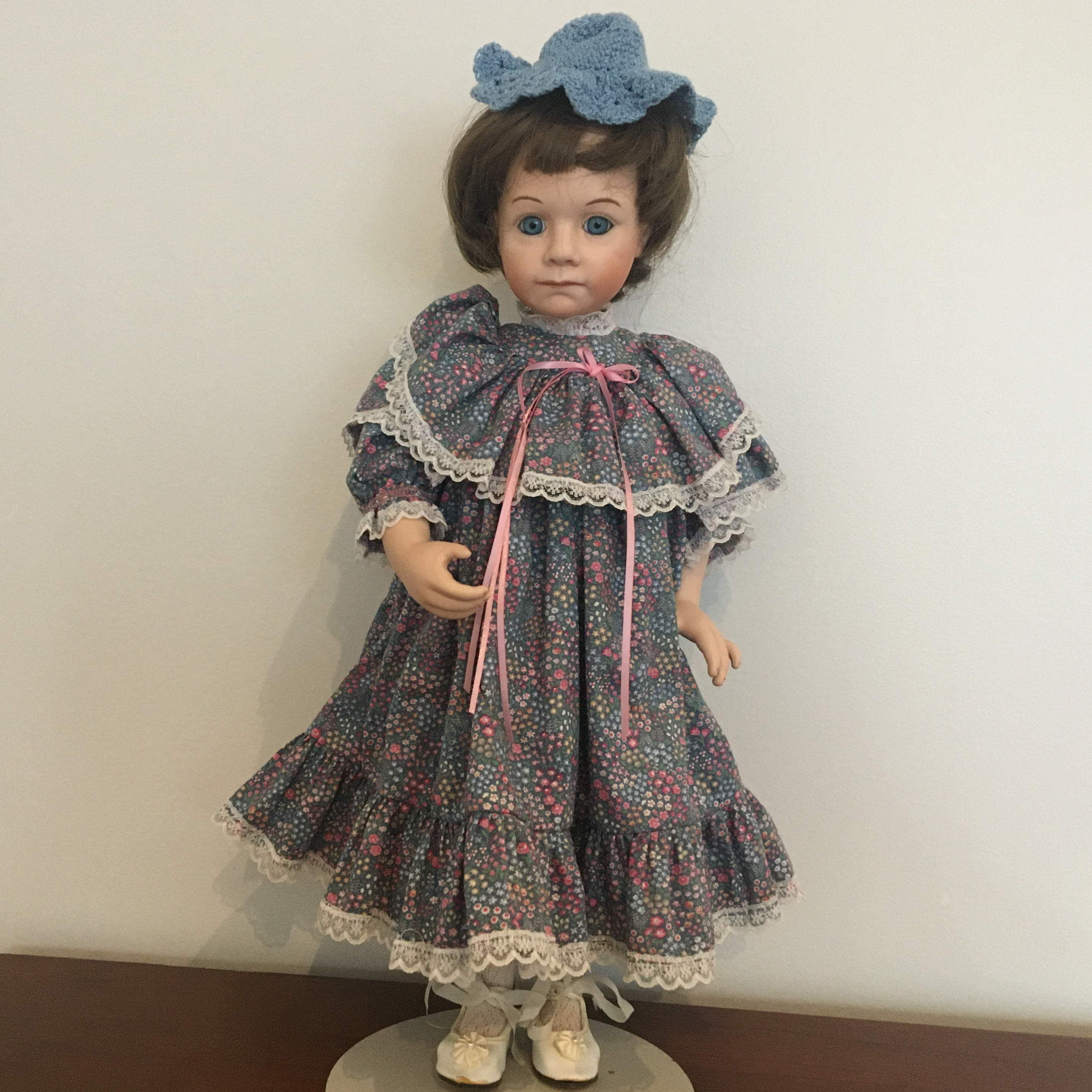 19-inch modern doll in calico dress with short brown hair