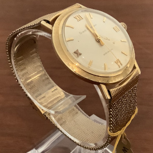 Girard-Perregaux Gyromatic automatic wristwatch in 14 karat gold with gold-filled band