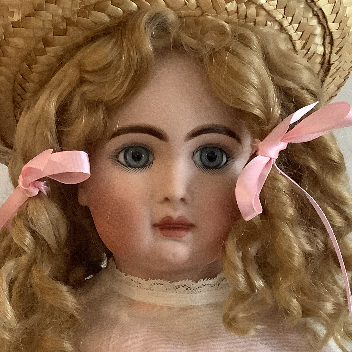 Close-up of reproduction doll's face