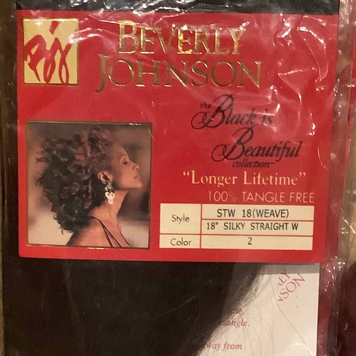 long, dark-brown weave hair