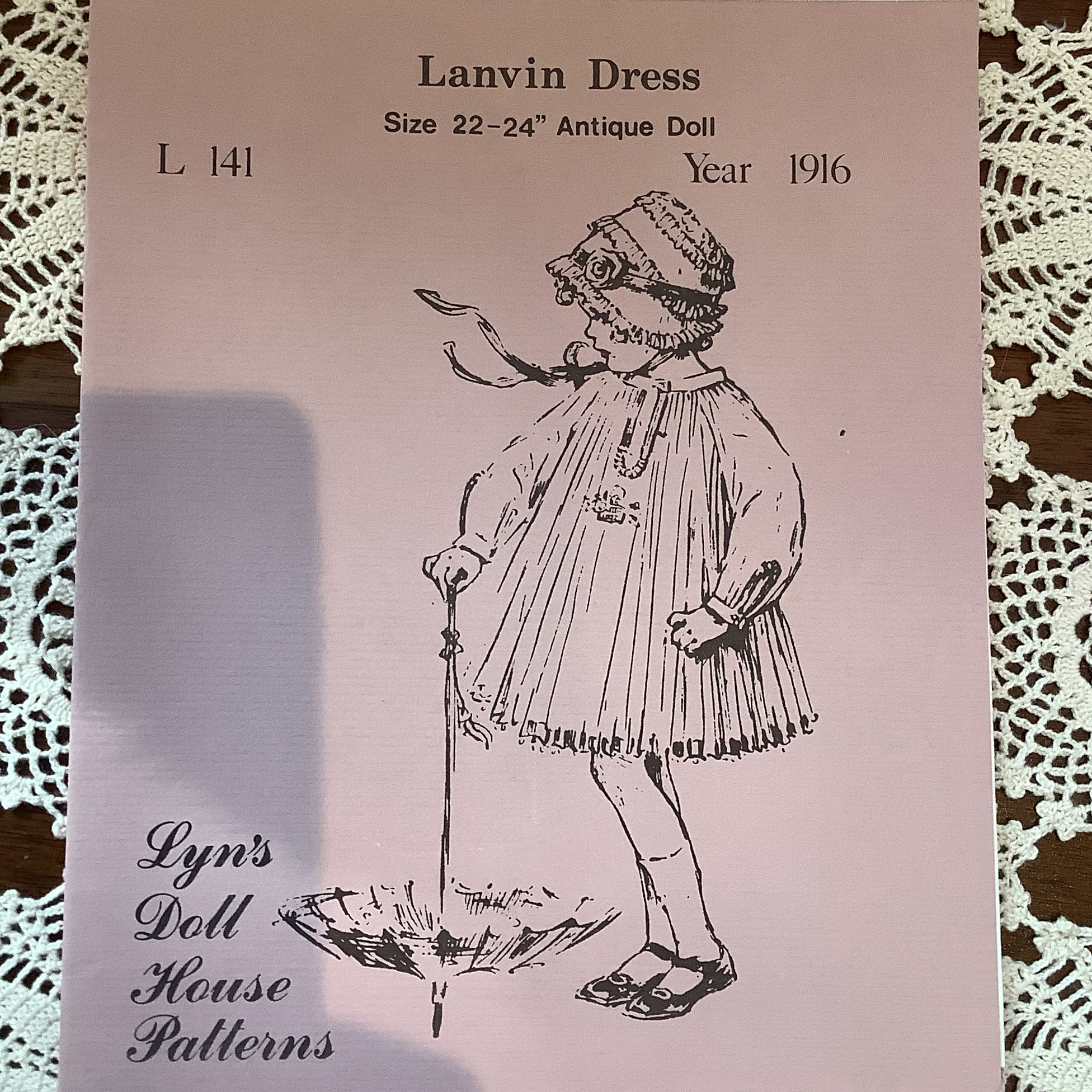 Pattern for short, pleated swing dress with pleated raglan sleeves