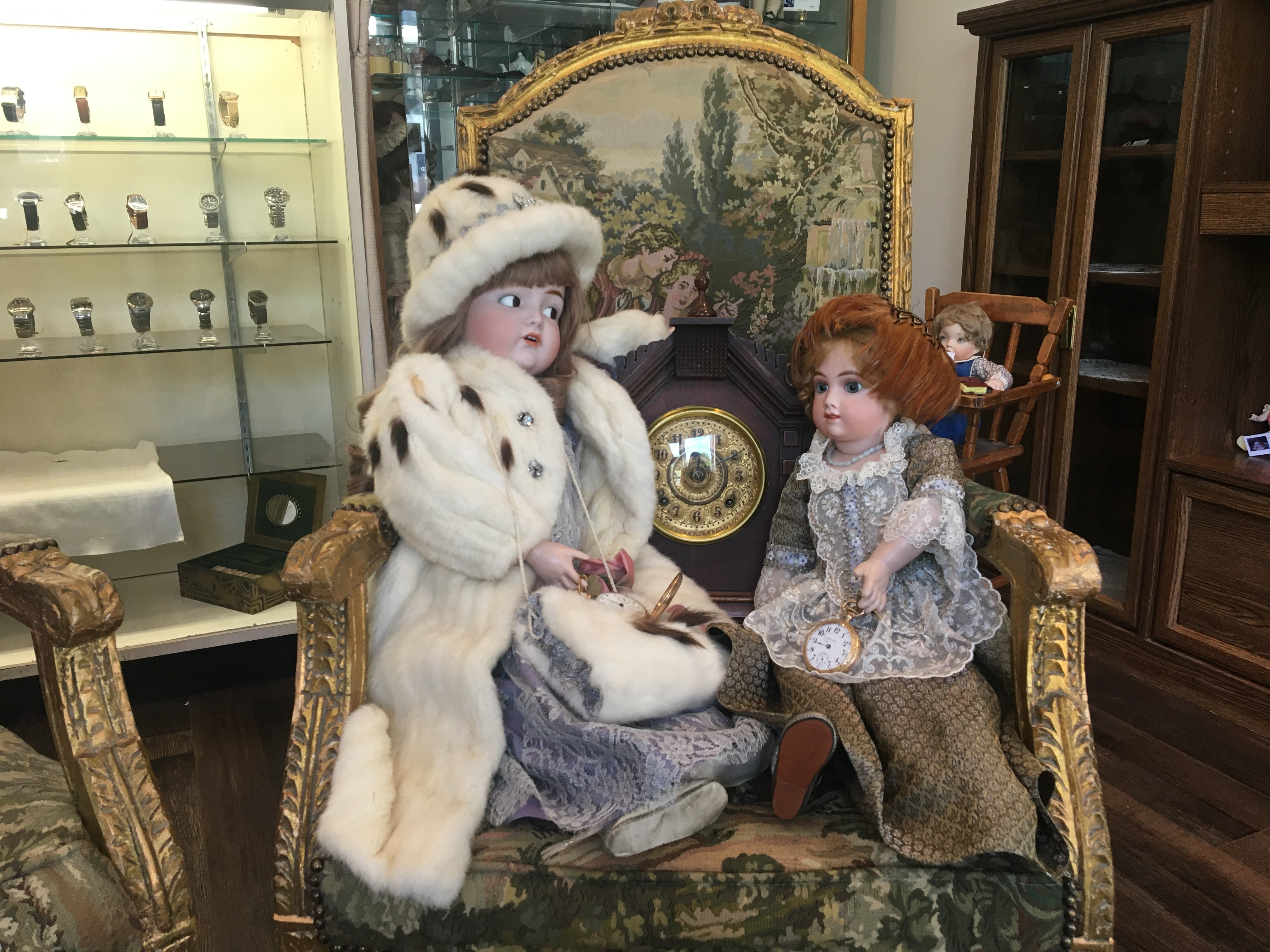 Dolls on a chair 