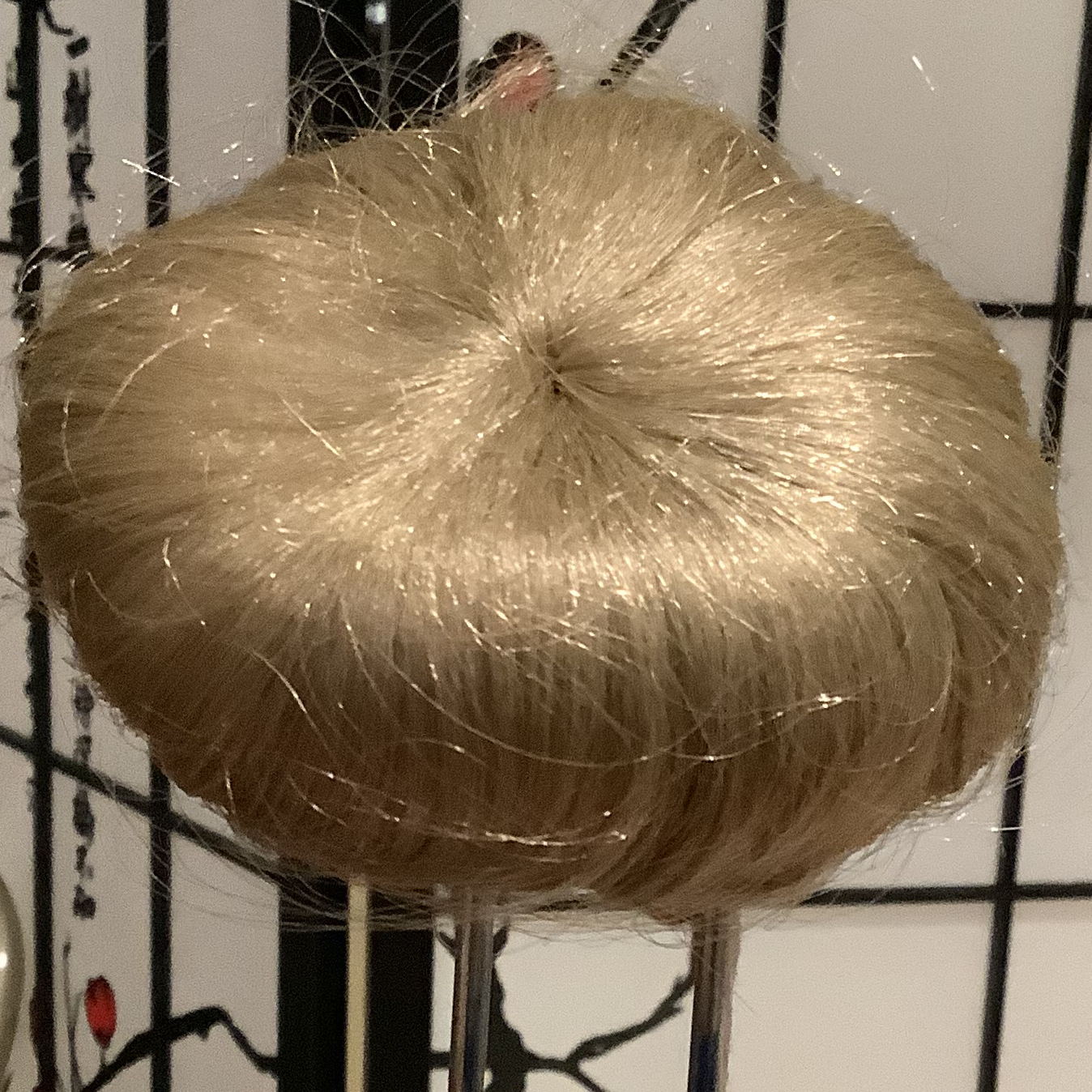 Dark blond wig in a bowl cut