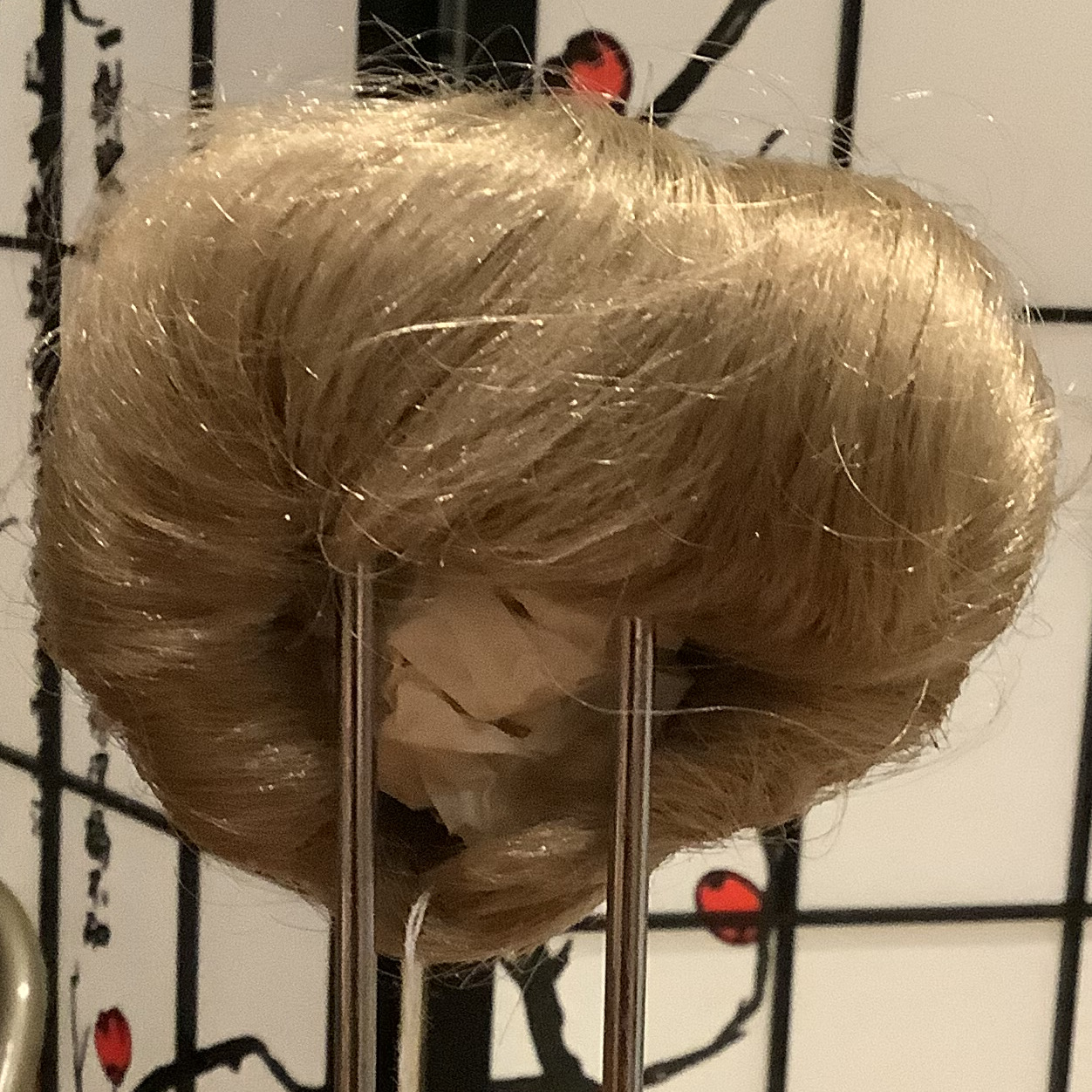 Dark blond wig in a bowl cut