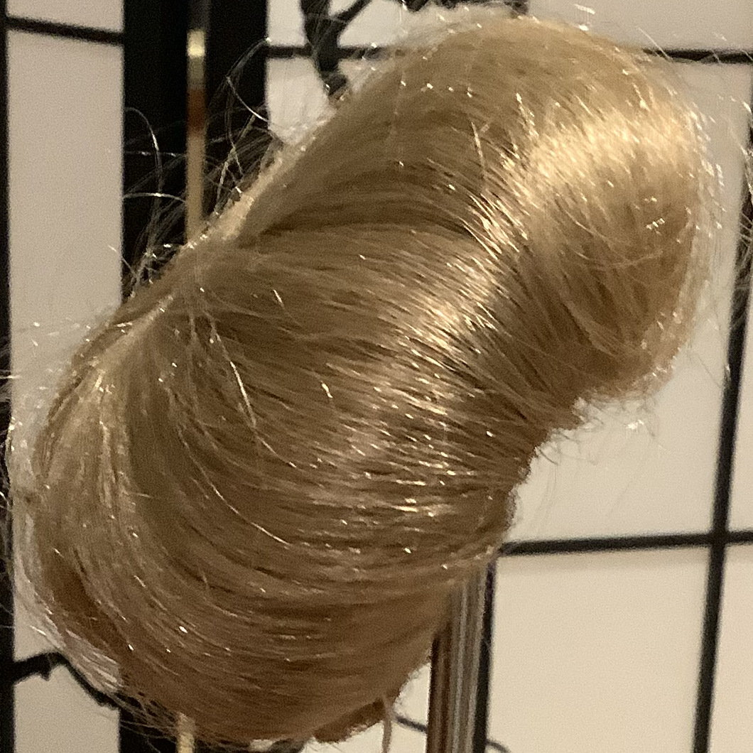 Dark blond wig in a bowl cut