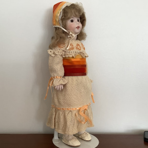 SFBJ Twirp doll in crocheted dress and matching velvet ribbon bonnet